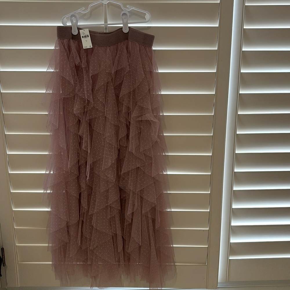 Anthropologie tulle skirt in light pink, size small.